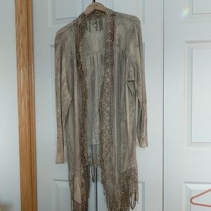 Ladies embellished, distressed LS sweater.